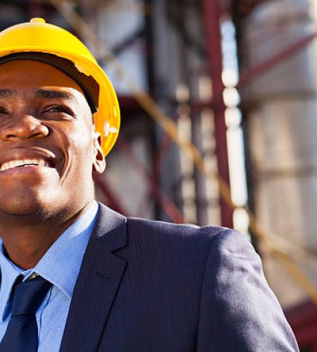 Specialized Recruitment Services happy african industrial manager at oil refinery plant