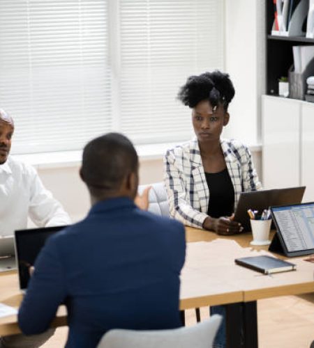 african group corporate business meeting in conference room